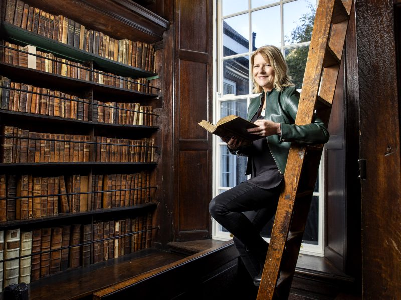 A slightly precarious Flor MacCarthy (ARA Ireland EYA Ambassador 2021) at Marsh's Library, © Marc O'Sullivan