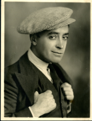 Portrait photograph of the comedian Jimmy O'Dea in a flat cap