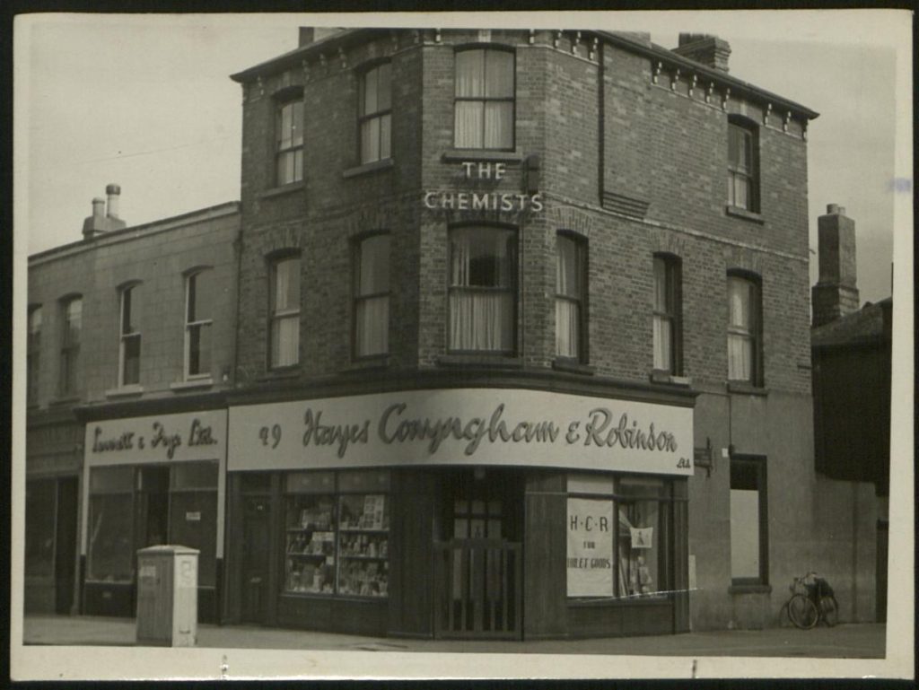 Black and white photograph of the Hayes, Conyngham and Robinson chemist shop at 49 Highfield Road, Rathgar, Dublin